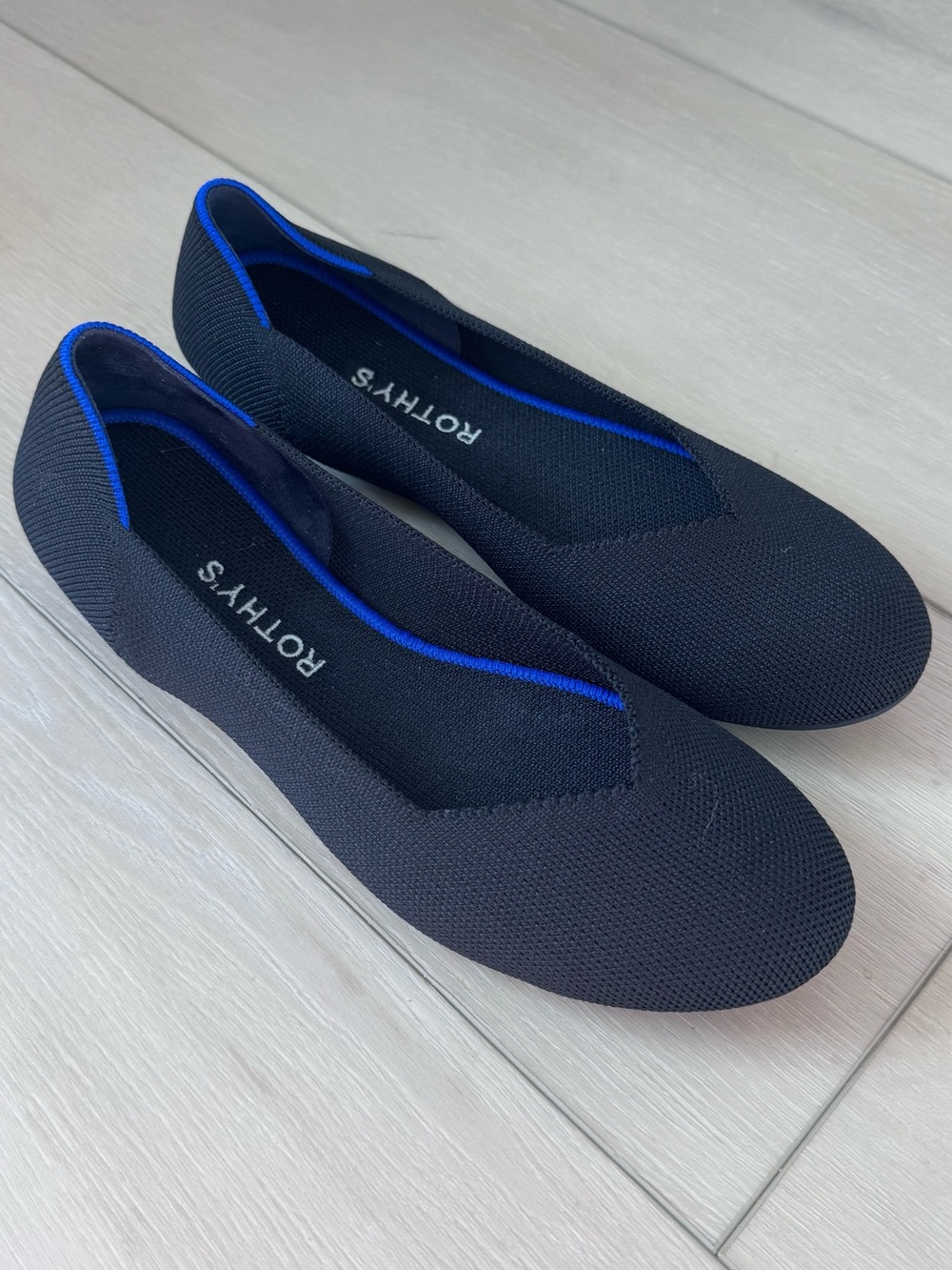 Rothy's Black Knit Flats with Royal Blue Trim